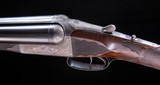 I. Hollis 12 ga Boxlock, Outstanding Period Engraving!
Barrels by Holland & Holland on a Westley Richards Patent action - 7 of 11