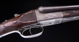 I. Hollis 12 ga Boxlock, Outstanding Period Engraving!
Barrels by Holland & Holland on a Westley Richards Patent action - 3 of 11