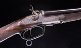 E.M. Reilly 16g. hammer double with exceptional wood and engraving. - 1 of 9