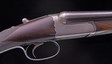 Westley Richards
Deluxe Droplock ~ Featuring scalloped action and single trigger with barrel selector - 3 of 10