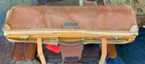 John Rigby & Co. "BEST" quality pinless Sidelock in its makers case - 11 of 11