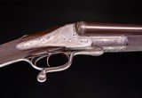 Alexander Henry 10g. Sidelock ~ What can I say but that this is one outstanding example of Scottish gunmaking!
Two barrel set cased - 6 of 10