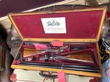 Robertson "Boss" Matched pair ~ Price is for the two guns with their makers case - 10 of 10