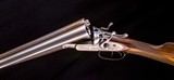 Joseph
Lang 12g. top lever hammer double in very nice condition - 9 of 9