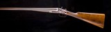 Joseph
Lang 12g. top lever hammer double in very nice condition - 1 of 9