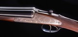 Holland and Holland 2" double with 28" barrels!How rare is that and in nice condition and in its makers case - 1 of 12
