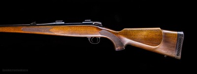 BSA (Stands for Birmingham Small Arms) .243 rifle with full length stock and cool Schnable