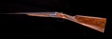 Fausti two-barrel set, one chambered in .410 and the other in 20 gauge