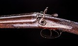 Holland & Holland Top Lever with nice hammer pulls!
2 3/4" nitro proofed - 5 of 8