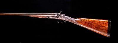 Holland & Holland Top Lever with nice hammer pulls!
2 3/4" nitro proofed