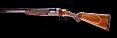 Belgium Over and Under 16ga ~ auto ejectors do not work 100% but extractors just fine so were blowing this gun out for almost free! ($800)