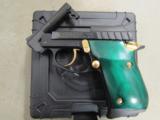Taurus PT22 Blued with Gold Accents Green Grips .22 LR - 7 of 9