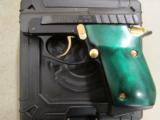 Taurus PT22 Blued with Gold Accents Green Grips .22 LR - 2 of 9