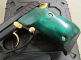 Taurus PT22 Blued with Gold Accents Green Grips .22 LR - 4 of 9