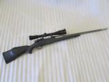 Weatherby Mark V .300 WBY Mag Left-Handed with Leupold VX-III 6.5-20X Scope - 1 of 9