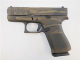 Glock G43X Battleworn Bronze Flag 9mm 3.41