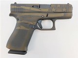 Glock G43X Battleworn Bronze Flag 9mm 3.41