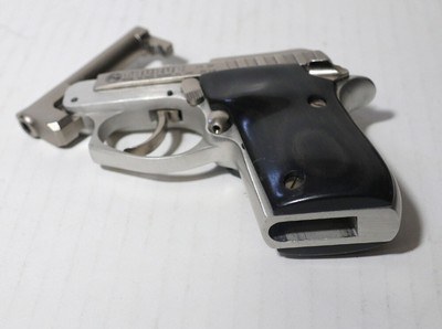 Taurus PT-2222 caliber semi auto pistol w/original case, manual,3 clips, ammo, and holster - Image 8 of 12