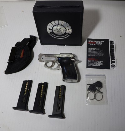 Taurus PT-2222 caliber semi auto pistol w/original case, manual,3 clips, ammo, and holster - Image 1 of 12