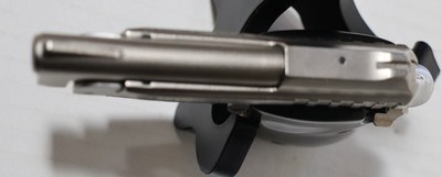 Taurus PT-2222 caliber semi auto pistol w/original case, manual,3 clips, ammo, and holster - Image 6 of 12