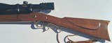 Thompson Center Hawkin 50cal Percussion comes with a 3x9 T/C hunter scope