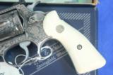 Smith & Wesson Model 63 .22lr Stainless Steel, deep fully engraved with genuine Ivory grips, boxed
- 7 of 12