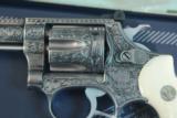 Smith & Wesson Model 63 .22lr Stainless Steel, deep fully engraved with genuine Ivory grips, boxed
- 1 of 12
