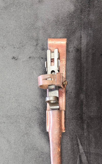 WW2 1941 Johnson Automatic Original Bayonet with leather Scabbard.