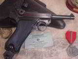 BLACK WIDOW LUGER BYF 41 ,9MM
WWII
- 5 of 9