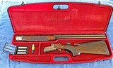 Armi Salvinelli Sporting EXL, 12 ga. 30", a best gun engraved by A. Giovinelli - Near Mint - 14 of 16