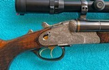 Krieghoff Neptun Primus Hand-detachable Sidelock Drilling 12 x 12 x 7x65r w/ .222 Rem insert bl., S&B 3-12x42 scope in claw mts., Cased - 23 of 23