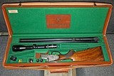 Krieghoff Neptun Primus Hand-detachable Sidelock Drilling 12 x 12 x 7x65r w/ .222 Rem insert bl., S&B 3-12x42 scope in claw mts., Cased - 1 of 23