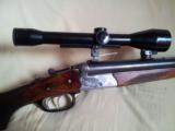 Fine, deluxe & hardly used HEYM Drilling in 30.06 & 12/70 GA with claw mounted German scope - 1 of 10