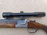 MERKEL Model 200E O/U Shotgun 16/70ga with an O/U Rifle 7x65R– Shot 16/70 Exchange Barrel
and Hensoldt 1.5-6x42 Scope
on quick release claw mounts - 4 of 15