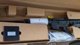 Bushmaster XM15 E2S QRC 5.56 NATO Carbine — New In Box, Includes Red Dot Optic - Image 1 of 15