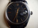 Rolex Oysterdate Model 6694 (Circa 1974) Black Dial
Analong Hand Wind - 2 of 10
