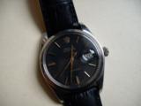 Rolex Oysterdate Model 6694 (Circa 1974) Black Dial
Analong Hand Wind - 1 of 10