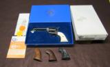 Colt SAA 3rd Gen. .44-40 Revolver 4 ¾” Barrel with 4 Sets of Grips and Orig Box - 1 of 15