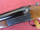 ITHACA-SKB MODEL 100 12 GAUGE SIDE BY SIDE WITH 30 INCH BARRELS - 1 of 15