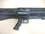 UTAS TACTICAL 12GA SHOTGUN W/ LITE & LASER - 1 of 5