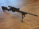 REMINGTON 700 SPS TACTICAL MAGPUL CHASIS .308 LOADED W/ EXTRAS - 1 of 6
