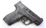 Smith & Wesson ~ M&P9 Shield ~ 9mm Luger - 1 of 5