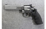 Smith & Wesson ~ 617-6 ~ .22 LR - 2 of 3