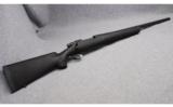 Remington Model 700 PSS Rifle in .300 RUM - 1 of 9