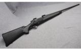 Remington 700 SPS DM Rifle in 7MM Remington Magnum - 1 of 9