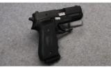 Sig Sauer P220 Carry Pistol in .45 ACP - 1 of 3