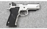 Smith & Wesson~ 4003TSW~ .40 S&W - 1 of 2