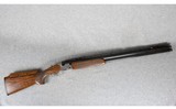 Beretta
694 ACS Sporting
12 GA