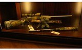 Thompson Center ~ Encore ~ .300 Win Mag / .50 BP - 1 of 13