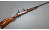 Remington, Model 700 BDL Custom Deluxe Bolt Action Rifle, 7 MM Remington Magnum - 1 of 9